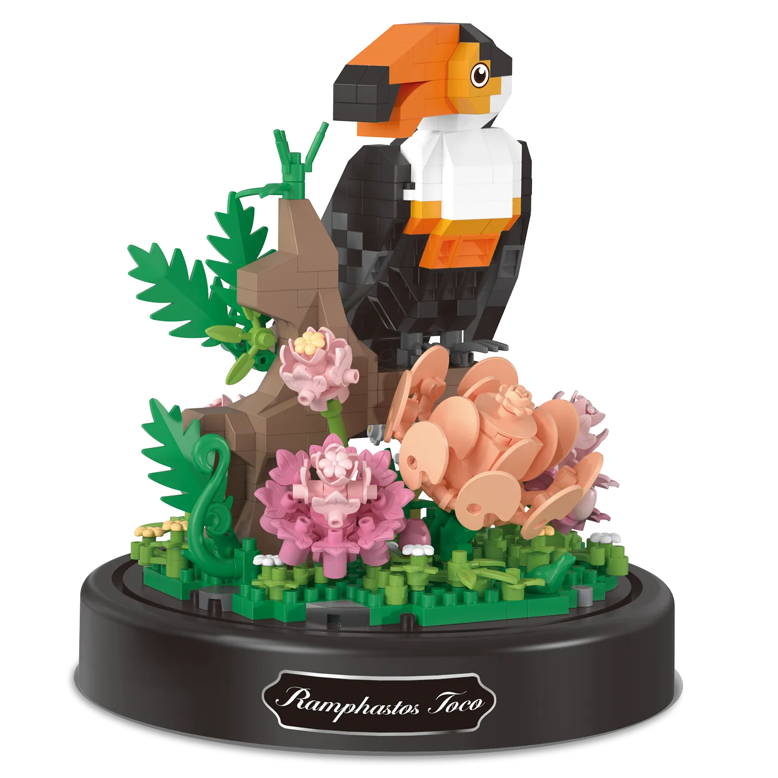 Productfoto van de Balody miniblocks op een tak zittende toekan met bloemen, onder een stolp