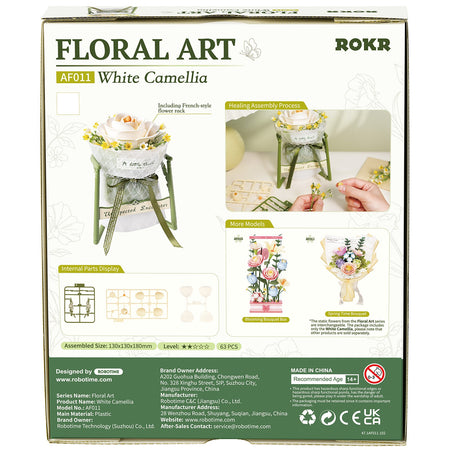 Achterkant verpakking van de Robotime Camellia, kunststof bouwpakket van een witte bloem