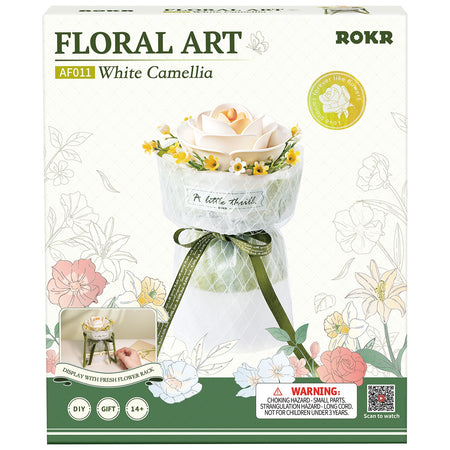 Voorkant verpakking van de Robotime Camellia, kunststof bouwpakket van een witte bloem