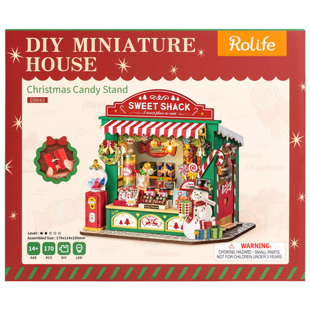 Voorkant verpakking van de Robotime Christmas Candy Stand, bouwpakket van een miniatuur snoepkraampje in kerstthema