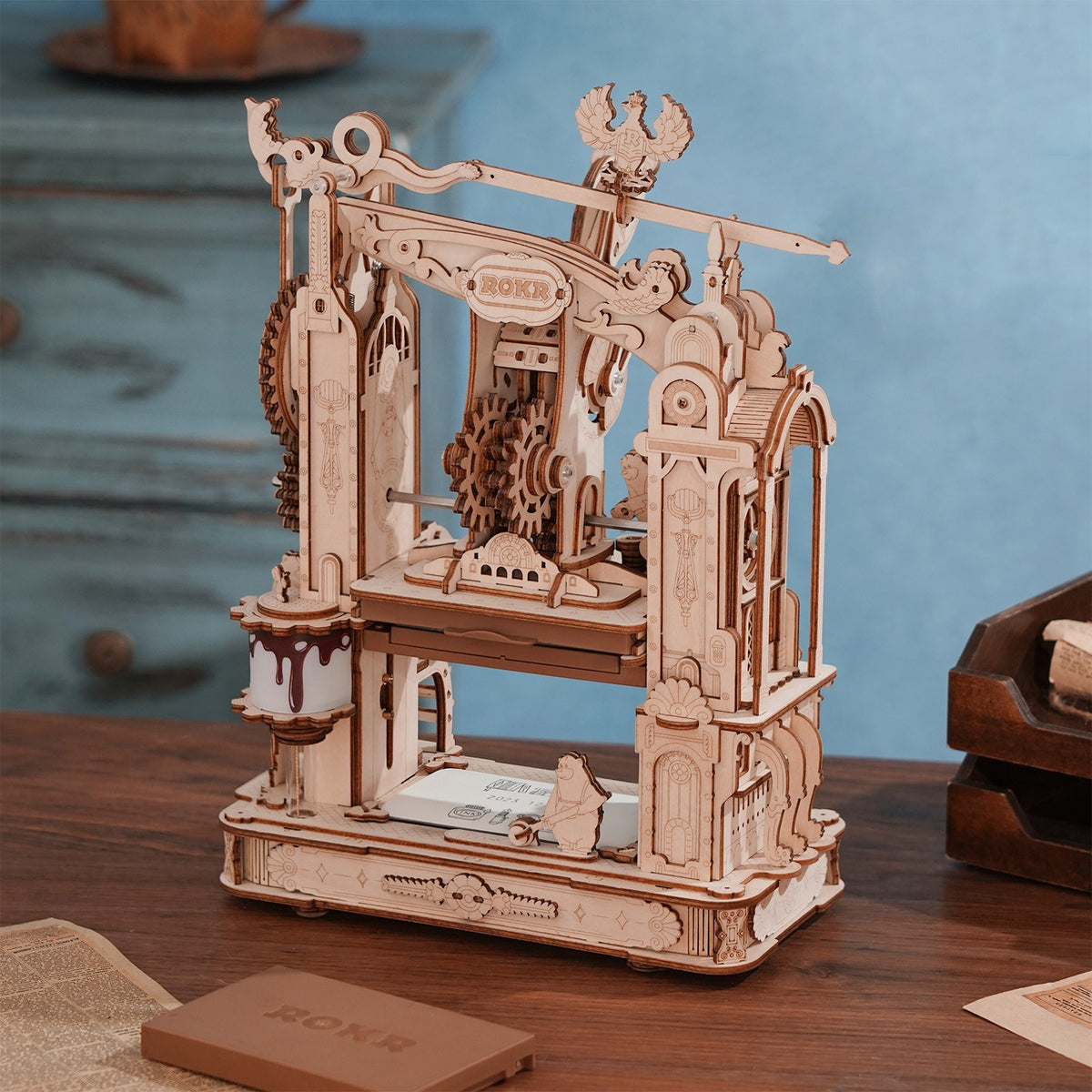 Atmospheric presentation of the Robotime Classic Printing Press, wooden construction set of a functioning printing press