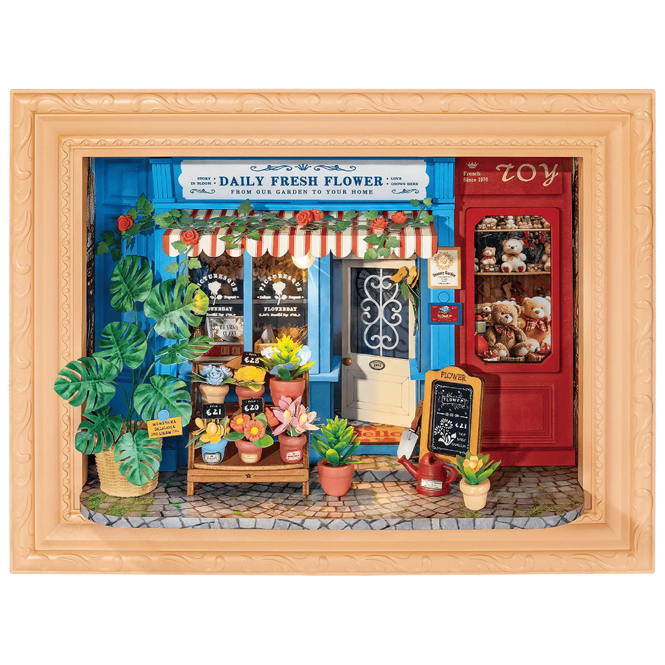 Productfoto van de Robotime Daily Fresh Flower, diorama in een lijst van een ouderwets winkeltje met bloemen en planten