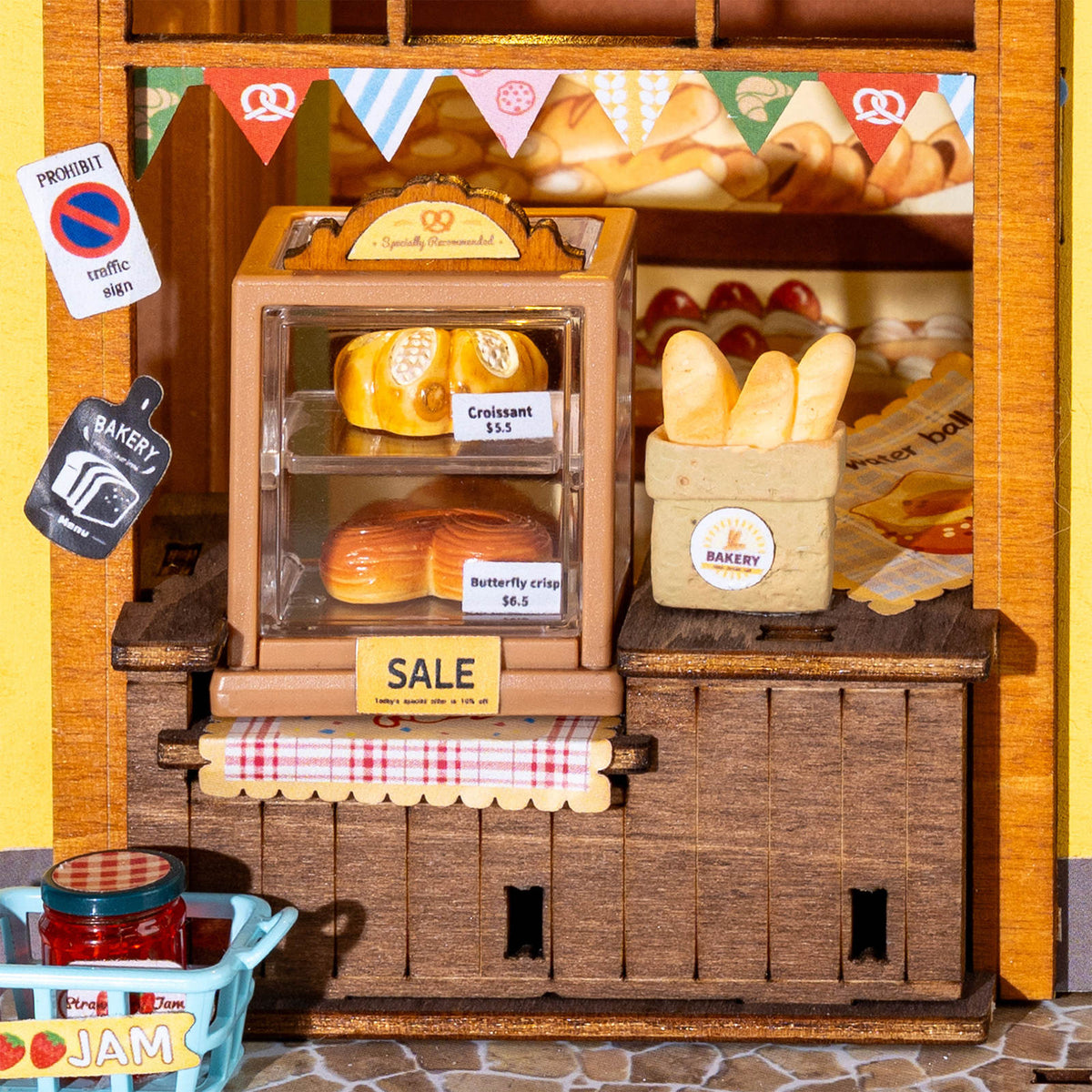 Uitgestald brood en banket in de Robotime Fluffy Cat Bakery