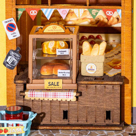 Uitgestald brood en banket in de Robotime Fluffy Cat Bakery