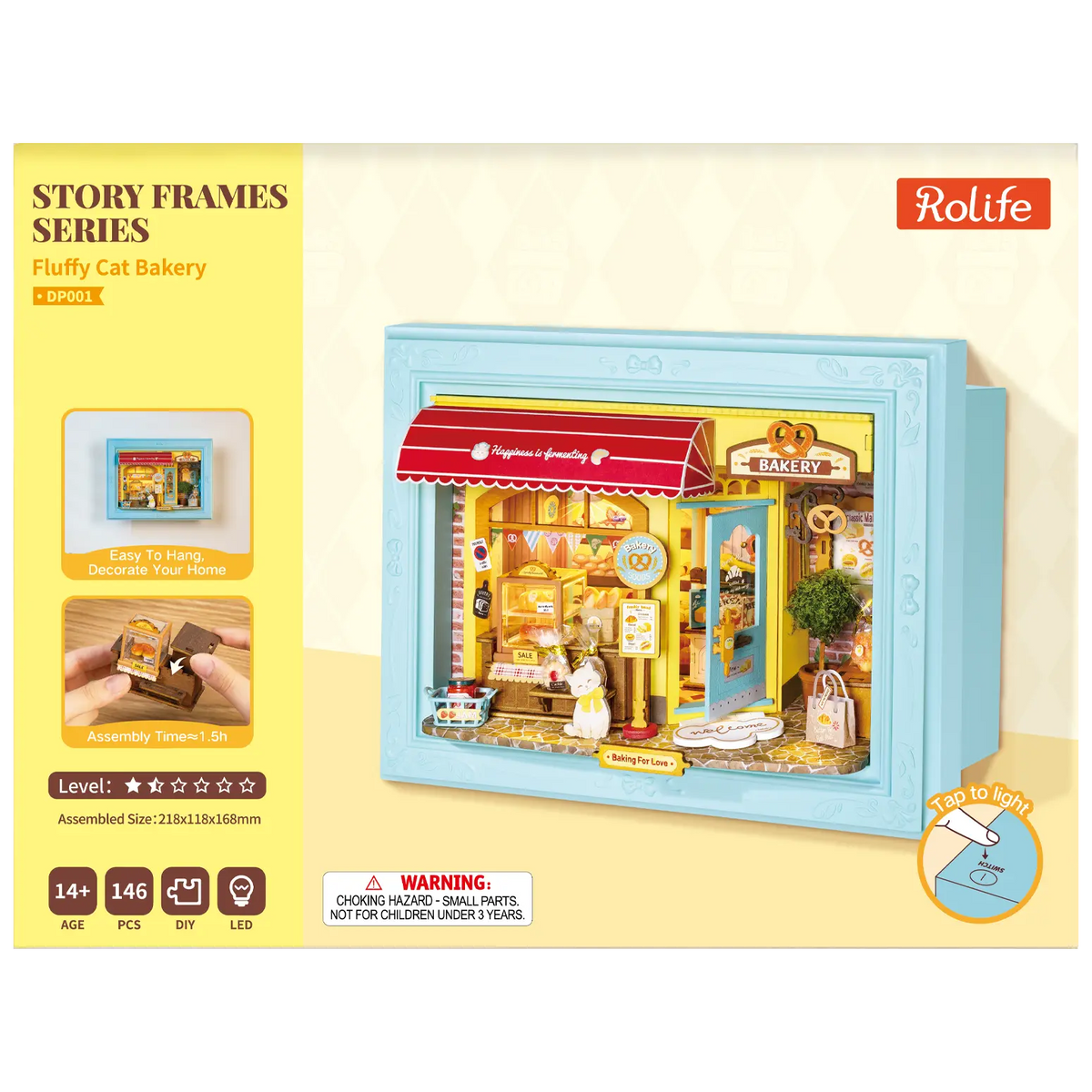 Voorkant verpakking van de Robotime Fluffy Cat Bakery, diorama in een lijst van een bakkerijtje met een kat
