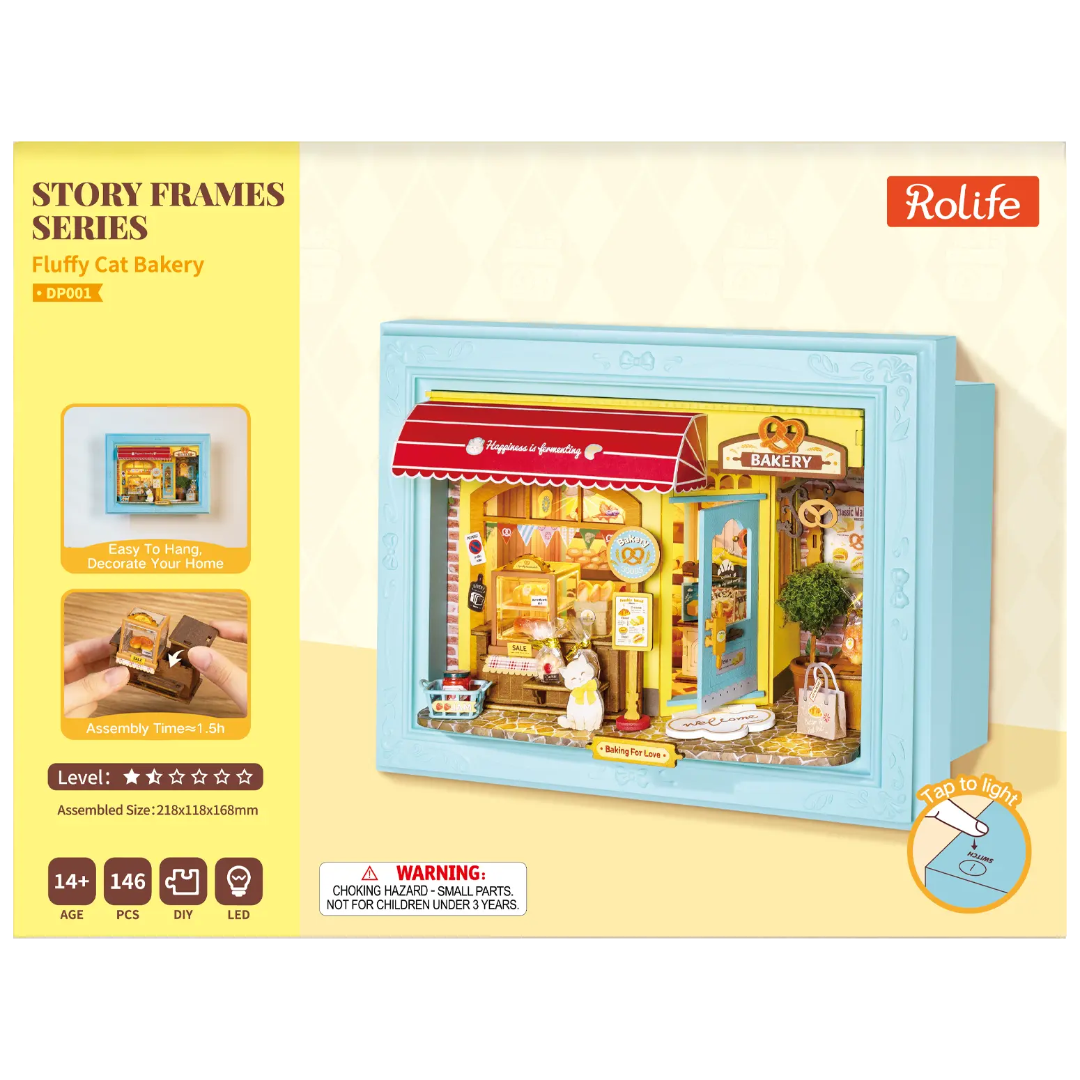Voorkant verpakking van de Robotime Fluffy Cat Bakery, diorama in een lijst van een bakkerijtje met een kat