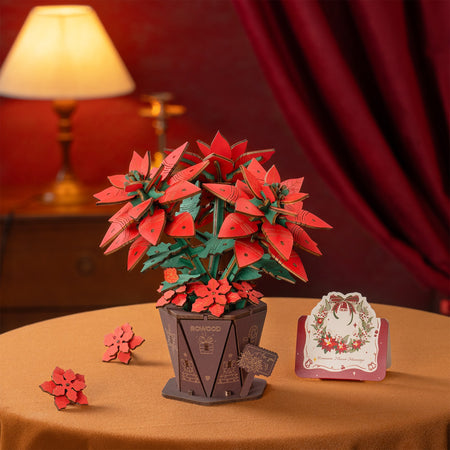 Sfeervolle presentatie van de Robotime Poinsettia, houten bouwpakket van een kerstbloem