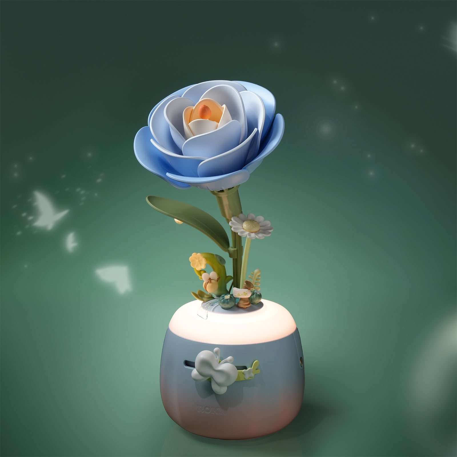Sfeervolle presentatie van de Robotime Starry Camellia Lamp, kunststof bouwpakket van een zachtblauw gekleurd nachtlampje in de vorm van een camellia