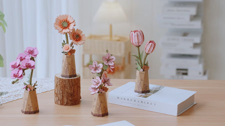 Sfeervolle videopresentatie van de Robotime Sakura, Gerbera, Pink Tulip en Purple Moth Orchid